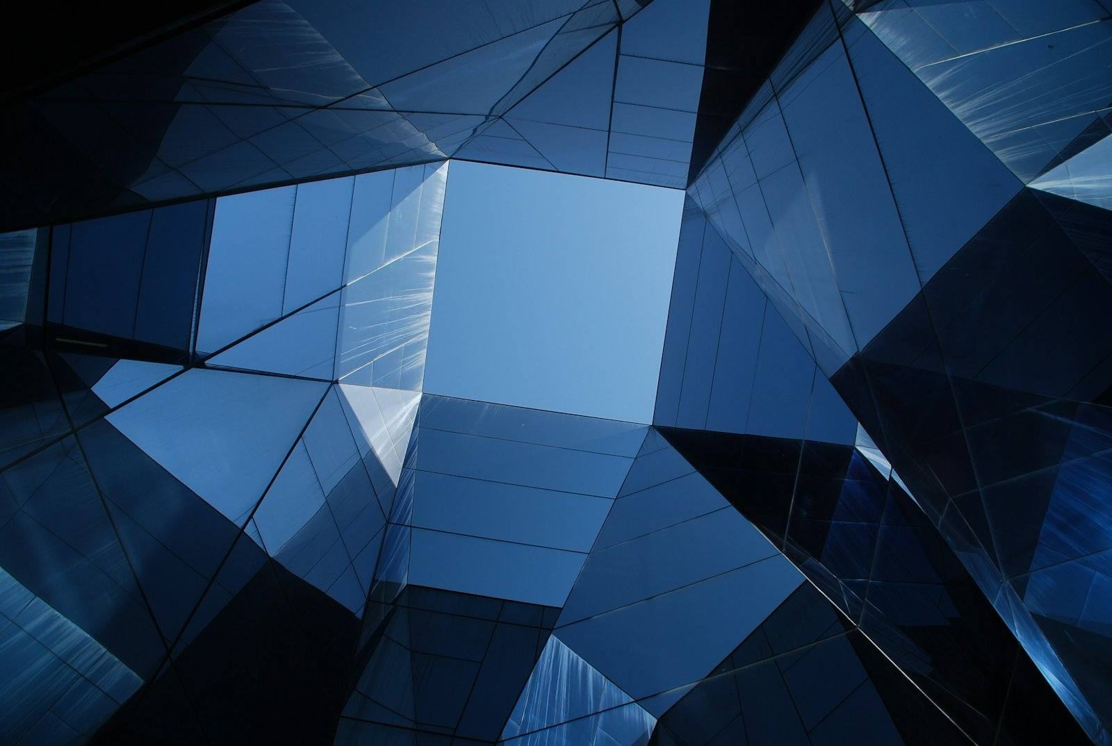 Faceted glass facade in deep blue